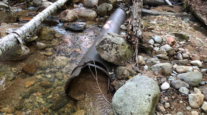 large pipe on the wilderness trail