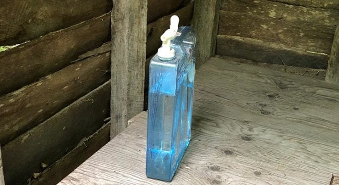 hand sanitizer in cattail shelter