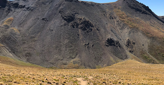 backpacking down saddle on colorado trail