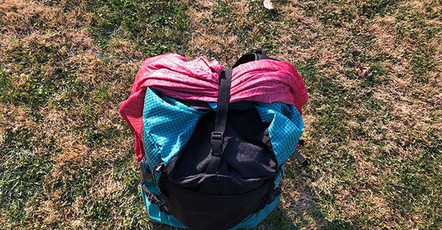 Backpack top strap