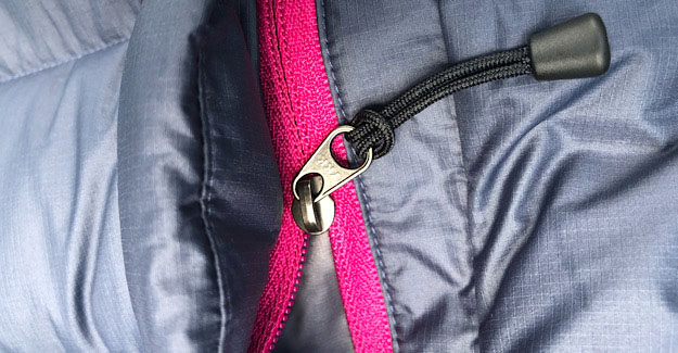 Zipper with pull tab on front of jacket