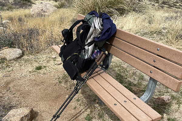 Stopping for a break at a memorial bench along the Arizona Trail