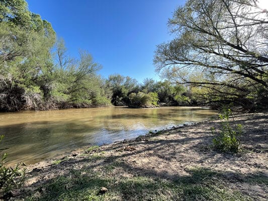 Eating dinner on the banks of the Gila River in Arizona