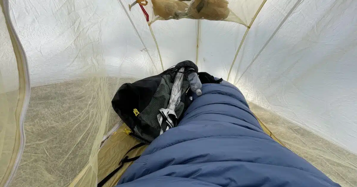 Interior of Big Agnes Tiger Wall UL1 with gear and quilt.